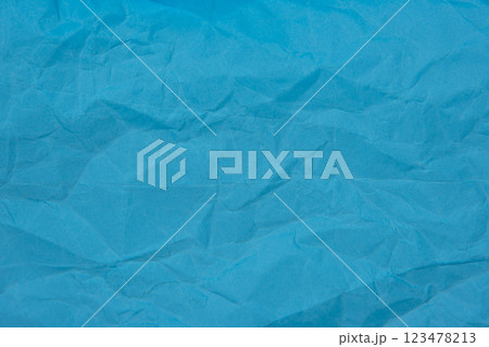 Crumpled blue paper craft textured background 123478213