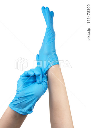 Blue nitrile medical gloves on hands isolated on the white Blue nitrile medical gloves on hands isolated on the white 123478300