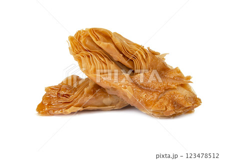 Honey baklava sweet isolated on the white background Honey baklava sweet isolated on the white background 123478512