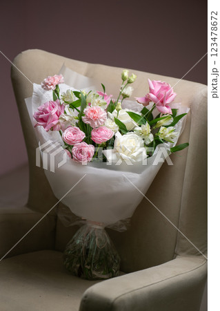 Delicate composition of white and pink roses in a basket 123478672