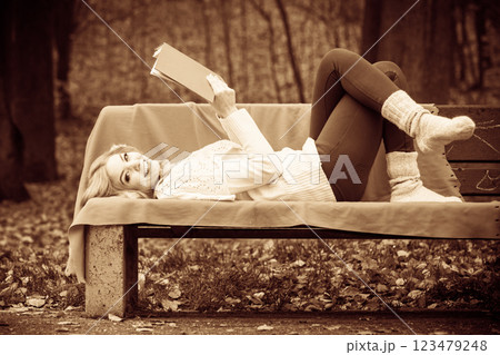 Blonde girl with red book. Blonde girl with red book. 123479248