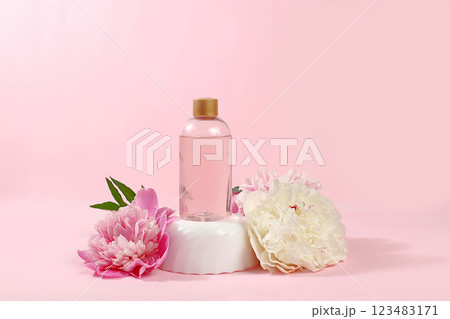 Spa and wellness composition with fragrant rose water and peony and rose flowers, aromatherapy and skin care, lifestyle and organic cosmetics concept, salon invitation and advertisement, selective 123483171