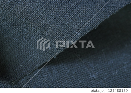 dark gray hemp viscose natural fabric cloth color; sackcloth rough texture of textile fashion 123488189