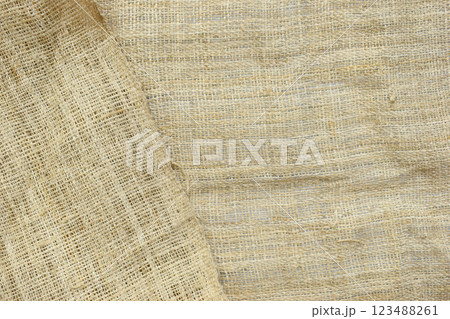 brown sackcloth texture background, crumpled burlap fabric textile for design 123488261