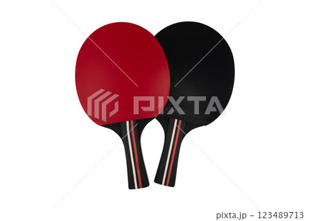 Ping pong paddle isolated in white background. Two red and black Table tennis rackets on a white background. Sports equipment for ping pong Ping pong paddle isolated in white background. Two red and black Table tennis rackets on a white background. Sports equipment for ping pong 123489713