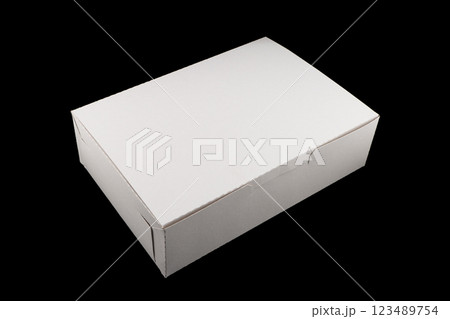 Side view white empty disposable paper fast food tray isolated on black background. Paper box isolated. Paper container Side view white empty disposable paper fast food tray isolated on black background. Paper box isolated. Paper container 123489754