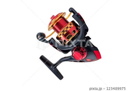 Fishing tackle. Fishing reel isolated on white background with clipping path. Modern fishing reel isolated. Fishing tackle. Fishing reel isolated on white background with clipping path. Modern fishing reel isolated. 123489975