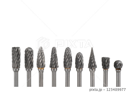 Carbide burrs isolated on white background. Rotary file burr texture. Burr set 123489977