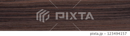 Deep charcoal and onyx striations flow over the ebony veneer, presenting a portrait of dark, natural allure Deep charcoal and onyx striations flow over the ebony veneer, presenting a portrait of dark, natural allure 123494157