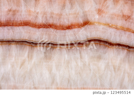 Natural Rainbow Onyx background, texture in your admirable beige tone for unique design. 123495514