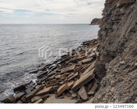Stone coast with volcanic rocks beach in Crimea Stone coast with volcanic rocks beach in Crimea 123497160