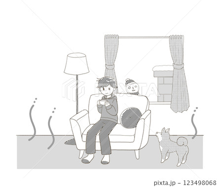 暖かい部屋で犬とくつろぐ男性 123498068