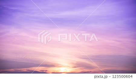 Beautiful dramatic scenic after sunset sky background after sunset, luxury soft gradient orange gold clouds and sunlight on the blue sky perfect for the background Beautiful dramatic scenic after sunset sky background after sunset, luxury soft gradient orange gold clouds and sunlight on the blue sky perfect for the background 123500604