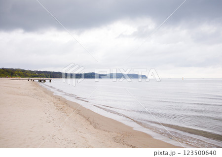 Empty beach by the Baltic sea in Sopot in moody cloudy weather 123500640