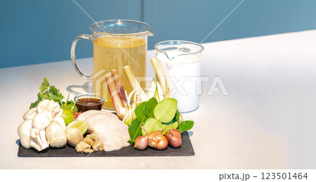 An ingredients set of famous thai soup. The ingredients can be bought at the market, chicken, vegetable, coconut cream, stock soup, herbs together combine as a great dish. An ingredients set of famous thai soup. The ingredients can be bought at the market, chicken, vegetable, coconut cream, stock soup, herbs together combine as a great dish. 123501464