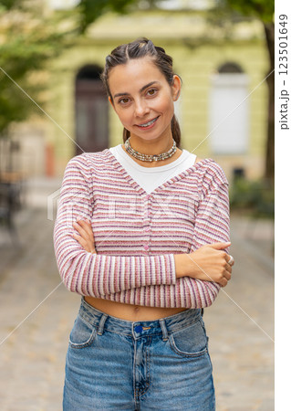 Portrait of happy woman face with braces on teeth smiling open eyes glad expression looking dreaming 123501649