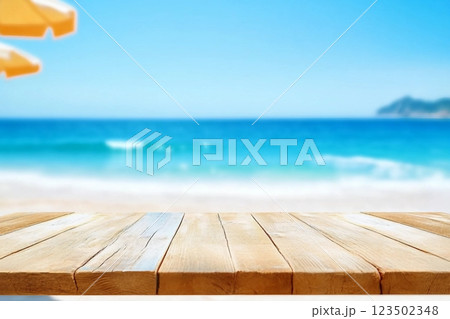 Wood table top on blurred blue sea and white sand beach background can be used for display or montage your products 123502348