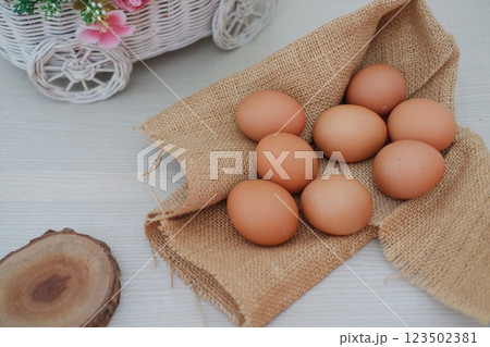 brown eggs on gunny sack brown eggs on gunny sack 123502381