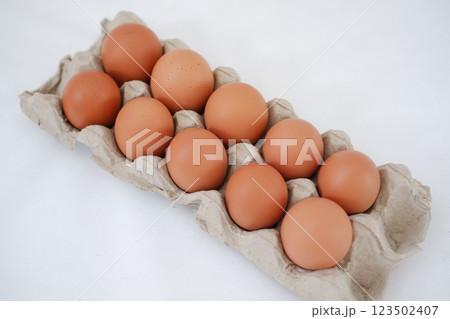 Eggs in a carton box Eggs in a carton box 123502407