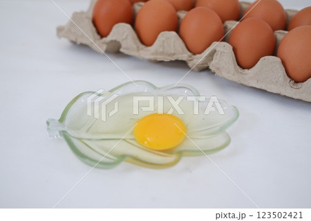 Eggs in a carton box 123502421
