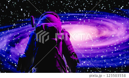 Astronaut observing a purple spiral galaxy in outer space. 3d render 123503558