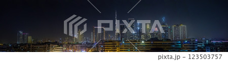 Stunning view of Dubai skyline at night featuring Burj Khalifa and city lights Stunning view of Dubai skyline at night featuring Burj Khalifa and city lights 123503757
