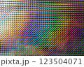 A vibrant, iridescent pattern of diamond shapes reflecting various colors, creating a mesmerizing visual effect reminiscent of art and design. 123504071