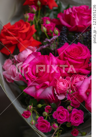Beautiful Bouquet of magenta fuchsia color roses 123505236