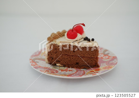 chocolate cake with cherry on the top 123505527