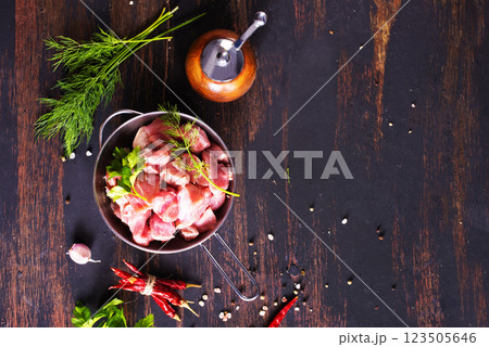 bowl of raw meat on wooden table, bowl of raw meat on wooden table, 123505646