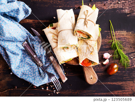 Ham roll with cheese and vegetables 123505689