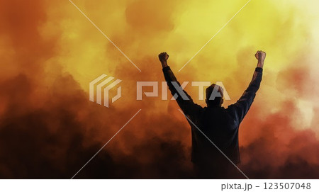 Empowered Individual Celebrating Victory Against Dramatic Colorful Background Empowered Individual Celebrating Victory Against Dramatic Colorful Background 123507048
