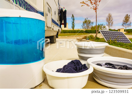 Washing laundry outdoor at caravan Washing laundry outdoor at caravan 123509931