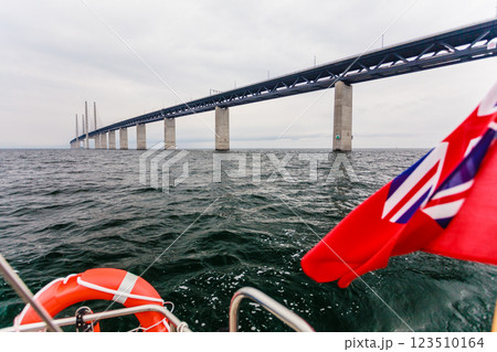 Yacht and oresund bridge between denmark sweden Yacht and oresund bridge between denmark sweden 123510164