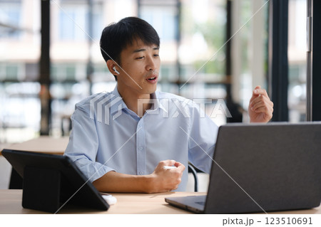 Business consultant advising clients and team in a video conference 123510691