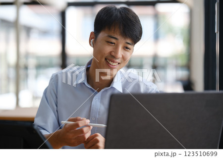 Business consultant advising clients and team in a video conference 123510699