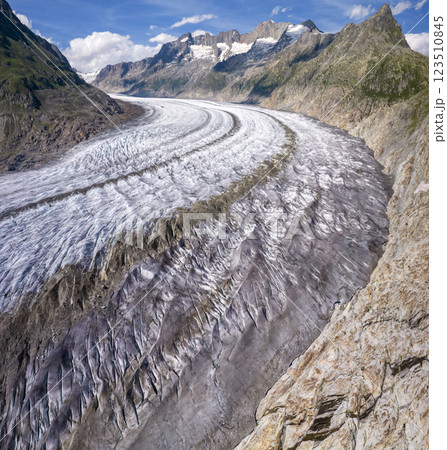 Aerial drone view of Great Aletsch Glacier Alps Switzerland in sunny summer day. Popular tourist destination 123510845