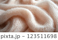 Creamy Knit Wool Fabric with Soft Folds 123511698
