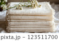 Stack of Cream Gauze Fabrics with Flowers 123511700