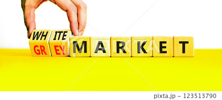 Grey or white market symbol. Concept words Grey market or White market on beautiful wooden blocks. Beautiful white background. Businessman hand. Business grey or white market concept. Copy space. 123513790