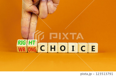 Right or wrong choice symbol. Concept words Right choice or Wrong choice on beautiful wooden blocks. Beautiful orange table orange background. Business right or wrong choice concept. Copy space. Right or wrong choice symbol. Concept words Right choice or Wrong choice on beautiful wooden blocks. Beautiful orange table orange background. Business right or wrong choice concept. Copy space. 123513791
