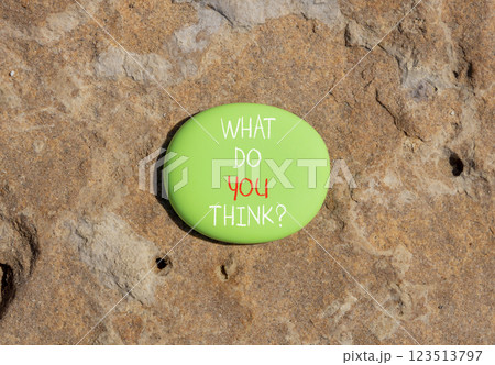 What do you think symbol. Concept words What do you think on beautiful green stone. Beautiful stone background. Business and What do you think concept. Copy space. 123513797