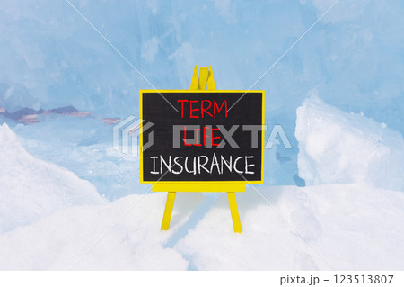 Term life insurance symbol. Concept words Term life insurance on beautiful black yellow blackboard. Beautiful blue Baikal ice background. Business term life insurance concept. Copy space. Term life insurance symbol. Concept words Term life insurance on beautiful black yellow blackboard. Beautiful blue Baikal ice background. Business term life insurance concept. Copy space. 123513807