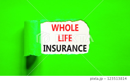 Whole life insurance symbol. Concept words Whole life insurance on beautiful white paper. Beautiful green table green background. Business whole life insurance concept. Copy space. 123513814