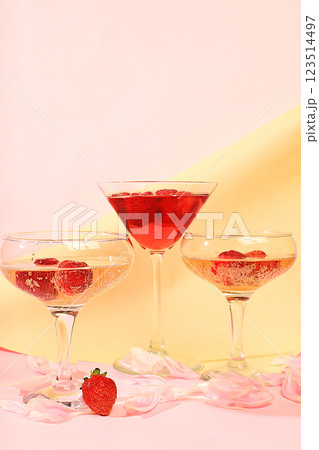 Modern still life with pink martini, alcoholic cocktail with champagne, strawberries on elegant modern background, minimal concept for bar and holiday party, cafe, advertising banner, selective focus, Modern still life with pink martini, alcoholic cocktail with champagne, strawberries on elegant modern background, minimal concept for bar and holiday party, cafe, advertising banner, selective focus, 123514497