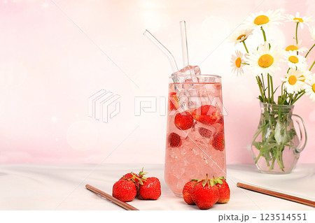 Fresh fruit cocktail, juice or punch with strawberries and ice with fresh berries, summer party concept. Advertising banner or business card for bar and restaurant, holiday alcoholic drinks. Fresh fruit cocktail, juice or punch with strawberries and ice with fresh berries, summer party concept. Advertising banner or business card for bar and restaurant, holiday alcoholic drinks. 123514551