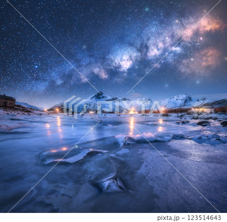 Milky Way arch, frozen sea and snowy mountains at starry night Milky Way arch, frozen sea and snowy mountains at starry night 123514643
