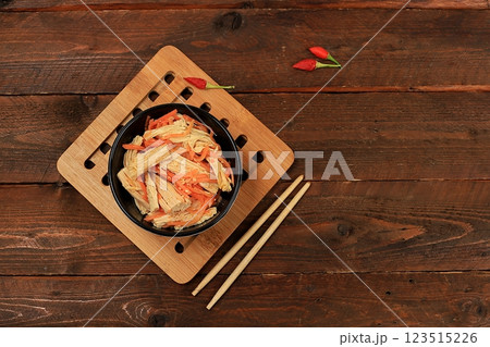 Korean side dishes for bbq dinner - kimchi and various types of vegetables, a set of fermented foods good for intestinal health - top view of glass bowls on wooden background, flat lay, copy space 123515226