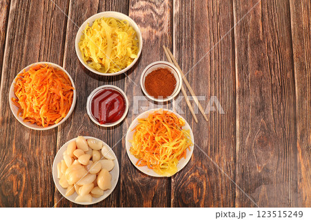 Korean side dishes, carrots, cabbage, kimchi and various kinds of vegetables, a set of fermented products, the concept of a detox diet, healthy and natural food, selective focus 123515249