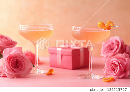 Celebratory cocktails romantic ambience lifestyle photography soft focus elegant presentation 123515797